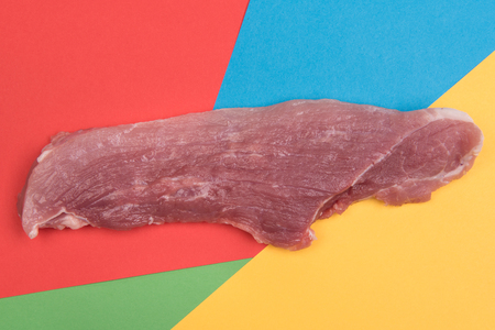 raw pork on colored backgroundsの写真素材