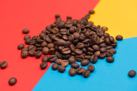 Coffee seeds on a colored backgroundの写真素材