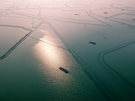Aerial view of lake and boatの写真素材
