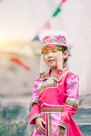 A girl in a Mongolia dressの写真素材