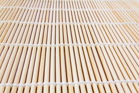 Sushi roll mat on white backgroundの写真素材