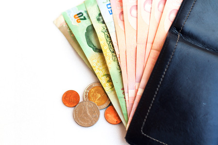 photo of wallet money isolated on white の写真素材