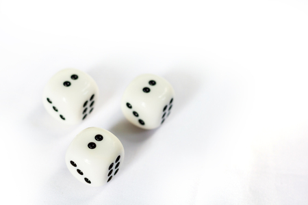 Photo of Three dices have triple two point isolated on white backgroundの写真素材