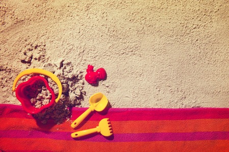 Top view of sandy beach with summer accessories and copy spaceの写真素材