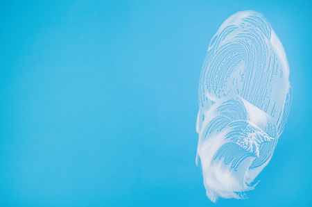 Cleaning background texture - chemical soap detergent foam on a clear glassの写真素材