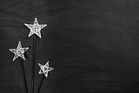 Christmas decoration background. Frame with black chalkboard and copy space around products.の写真素材