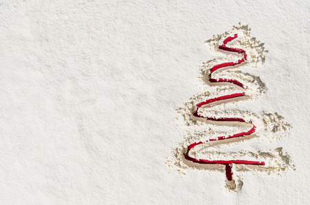 Christmas or winter background with fresh white snow texture. Image taken from above, top view. Studio closeup or macro product shot with ample copy space.の写真素材
