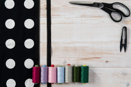Concept image of sewing accessories. Image taken from above, top view. Background for creative...