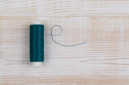 Concept image of sewing accessories. Image taken from above, top view. Background for creative fashion blog, concept or advertising.の写真素材