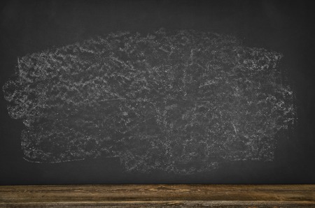 Black blank chalkboard texture with room for text or drawingの写真素材