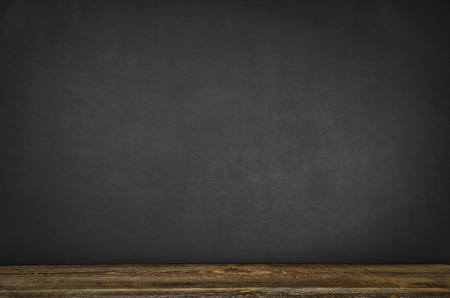 Black blank chalkboard texture with room for text or drawingの写真素材