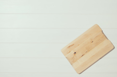 Product photo of white, painted, wooden table. Visible texture background. Studio image taken from above, top view.の写真素材