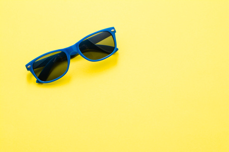 Modern sunglasses on colorful background with copy space. Product photograph with room for text.の写真素材