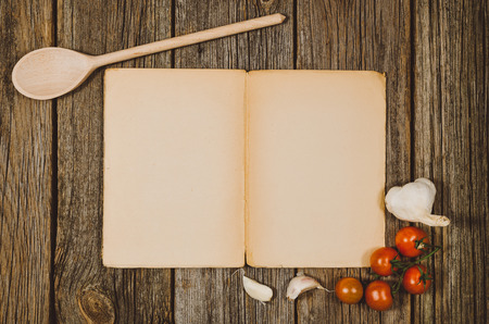 Baking or cooking ingredients background. Top view photograph with kitchen utensils on vintage, natural, raw, wooden background with visible texture.の写真素材