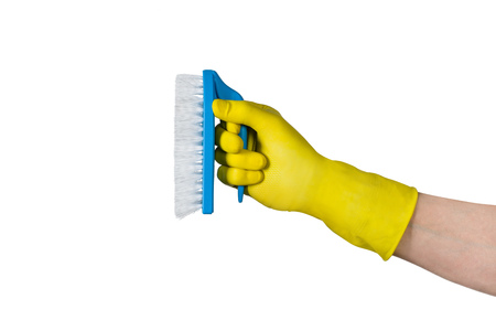 Cleaning conept - hand cleaning with cleaning brush. Isolated on white backgroundの写真素材