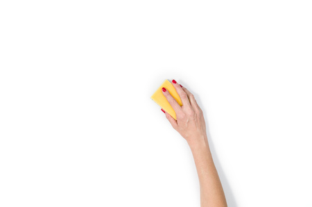 Isolated womans hand cleaning on a white background. Cleaning or housekeeping concept background....