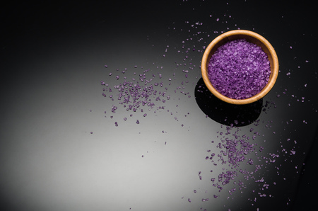 Spa concept background on black reflective background. Top view frame product photograph with copy space. Concept photograph with room for text or advertising.の写真素材