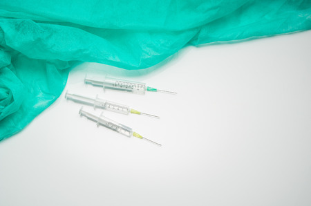 Syringe set isolated on white background with copy space. Medical theme frame for concept or product placement.の写真素材