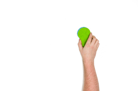 Mans or womans isolated hand cleaning on a white background. Concept image with copy space for text or design elements. Image taken from above, top viewの写真素材