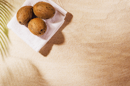 Sandy beach background top view with visible sand texture. Backdrop for mockups and advertising.の写真素材