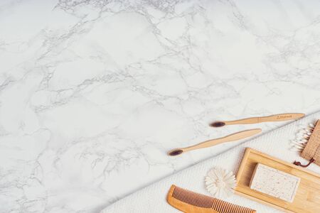 Zero waste concept. Flat lay composition with natural body care or bath products and copy space for text on white marble background. Top view with copy spaceの写真素材