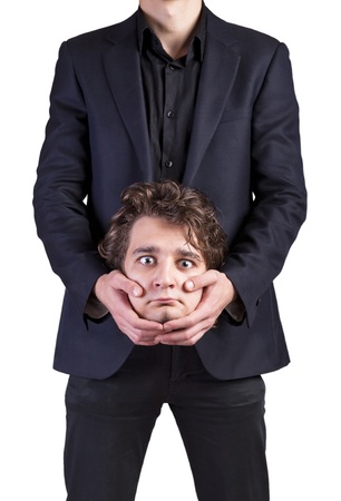 Business man holding his headの写真素材