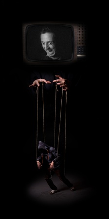 The media controls the marionette puppet の写真素材