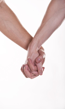 Two man holding hands の写真素材