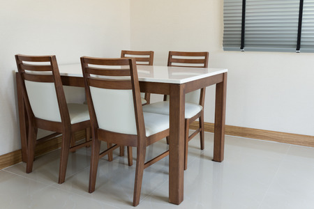 Wooden dining table for 4 peopleの写真素材