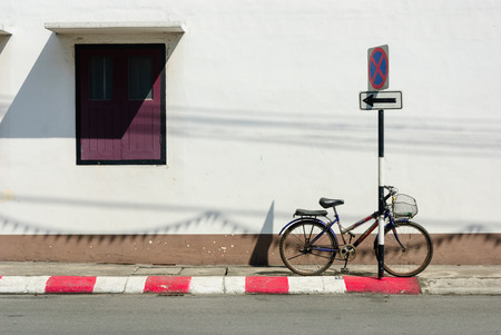 vintage bicycle on white wallの写真素材