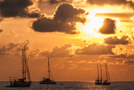 A photo of Boat, ocean and sunsetの写真素材