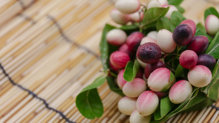 karonda fruit on wooden backgroundの写真素材