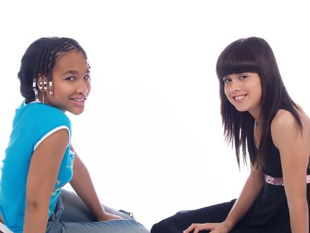 2 cute girls with different ethnic backgroundsの写真素材