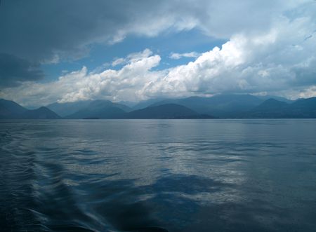 View over Lago Maggiore in Italy during a rainstormの写真素材