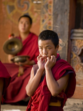 JAKAR, BHUTAN - OCTOBER 23, 2010: Monks rehearsing for the Jakar tsechu which is held the next day on Oct. 23, 2010 in Jakar. Tsechu are annual religious Bhutanese festivals usually around Octoberのeditorial素材