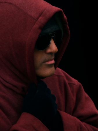 An attractive man with a hoody and shadesの写真素材