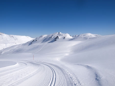 Winter hiking and langlauf trail in the alps at Koenigsleiten Austriaの写真素材