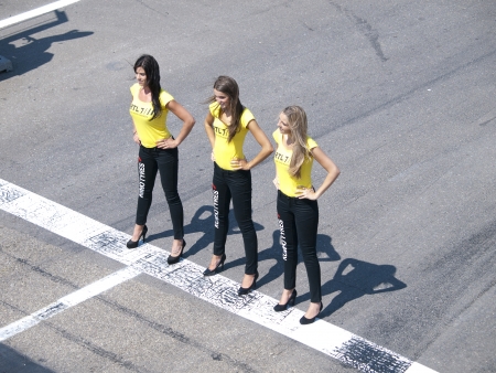 ZANDVOORT, NETHERLANDS - JULY 7: pitbabes are posing behind the pitlane in the paddock after the race of the Fia GT series during the RTL GP Masters in Zandvoort on July 7, 2013 in Zandvoort, Holland.のeditorial素材