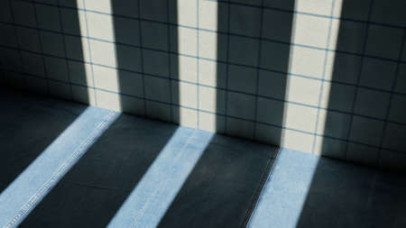 It is a room with a blue floor and a green wall with pictures. Three vertical lights enter through a...