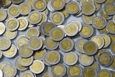 fullframe background texture of 10 baht coin of Thailandの写真素材