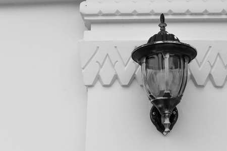 A classic wall lamp at the white pagoda of Asokaram temple in Samutprakarn province ,Thailandの写真素材