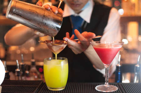 A bartender prepared drinks at nightclub in Bangkok Thilandの写真素材