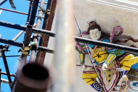 The Chinese sculpture at ceiling of Pagoda construction site at Pariwat Temple in Bangkok Thailandのeditorial素材