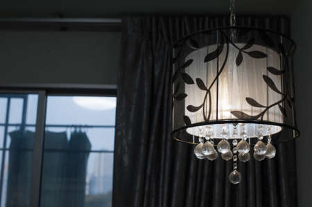 Modern hanging lamp in a roomの写真素材