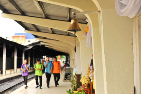 The yellow bell was hanging at The train station in Samutsakorn province, Thailandの写真素材