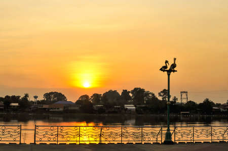 Sunset view at Chao praya river in Chainat province, Thailandの写真素材