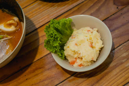 Top view of Japanese style Potato salad at Sapporo ramen restaurant in Bangkok Thailandの写真素材