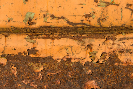 rusty scratches on orange painted steel - texture