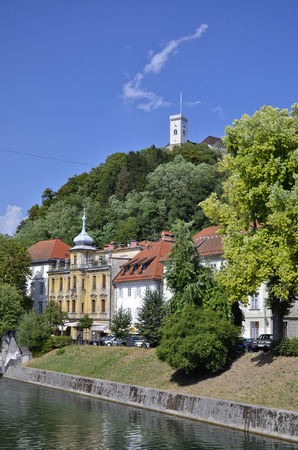 Picturesque view of the riverfront Ljubljanica and the tower of the castleのeditorial素材