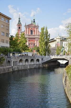 Characteristic glimpse of the beautiful center of the Slovenian capital across the river Ljubljanicaのeditorial素材